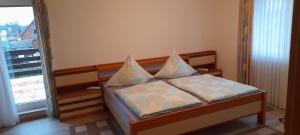 Katil atau katil-katil dalam bilik di Ferienwohnung Aue Deußen