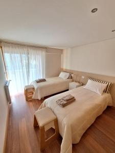 Postel nebo postele na pokoji v ubytování Casa Santana