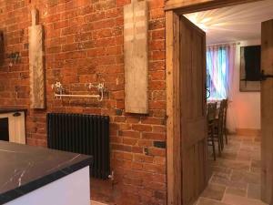 Η κουζίνα ή μικρή κουζίνα στο Priory Meadow Cottage +78 φωτογραφίες