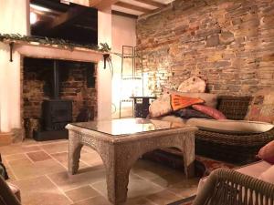 Χώρος καθιστικού στο Priory Meadow Cottage