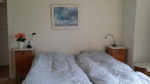 Postel nebo postele na pokoji v ubytování Bed & Breakfast i Vorupør