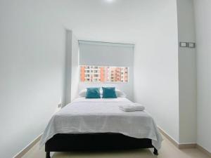 מיטה או מיטות בחדר ב-Excepcional Apartamento -WAIWA HOST