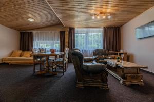 Posezení v ubytování Grand Hotel rooms