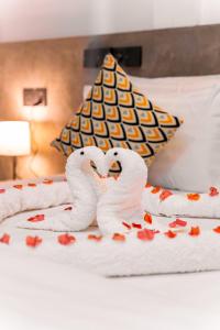 Letto o letti in una camera di Holiday Crib