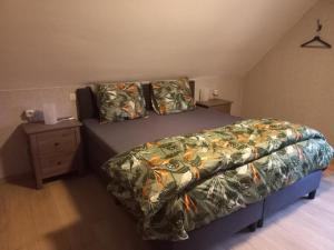 Säng eller sängar i ett rum på Vakantiewoning Steger einde