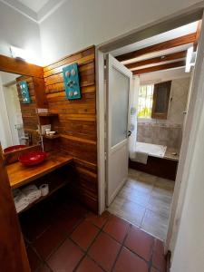 Un baño de Hostería y Cabañas Altamar De Las Pampas