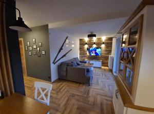 Sjónvarps- og/eða afþreyingartæki á Apartamenty Stara Wisła