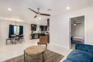 a living room with a couch and a table at Your Downtown Home With California King Bed Unit A in Phoenix