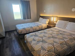 Postel nebo postele na pokoji v ubytování Motel 6 Sinton TX