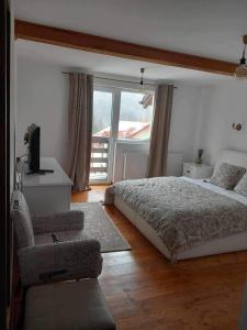 En eller flere senge i et værelse på Vila Miro Monte + 29 billeder