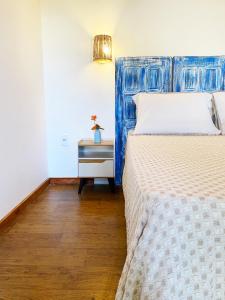 Postel nebo postele na pokoji v ubytování Santo Hostel