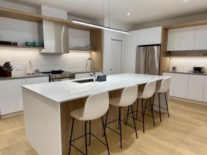 Kuchyň nebo kuchyňský kout v ubytování Tremblant Luxe 3BR Pet-friendly, Entertainment!