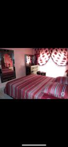 Voodi või voodid majutusasutuse RESIDENCE HAMZA Cosy appartement only family à Gueliz toas