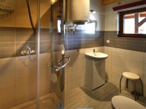 a bathroom with a shower and a sink and a toilet at Holiday houses close to the beach, Siano ty in Sianozety