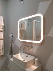 Koupelna v ubytování Piccolo Hotel Olina
