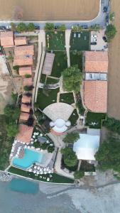 an aerial view of a yard with two pools at Flumen Park in Tirana