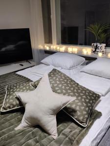 Postel nebo postele na pokoji v ubytování Inka Apartments