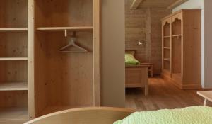 Postel nebo postele na pokoji v ubytování Bärghuis Jochpass - Alpine Hideaway - 2222müM