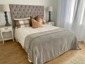 Katil atau katil-katil dalam bilik di Coatesville Country Retreat