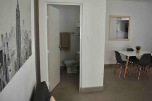 a room with a table and chairs and a dining room at Gabby’s Accesible House in Private area in Mexicali +33 photos