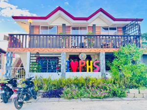 a motorcycle parked in front of a house at Precious Homestay -Suite Room in Burgos