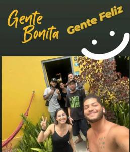 a group of people standing in front of a store at Hostel Gentileza - Guest House in Alto Paraíso de Goiás