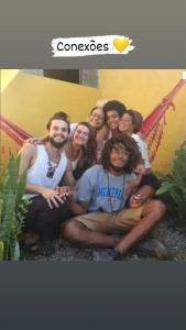 a group of people posing for a picture at Hostel Gentileza - Guest House in Alto Paraíso de Goiás