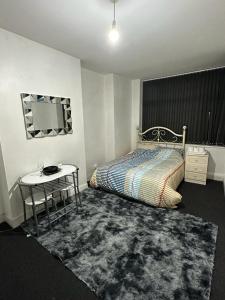 Кровать или кровати в номере Humu Place Deluxe Room