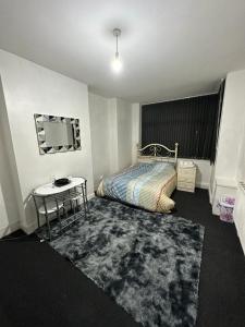 Кровать или кровати в номере Humu Place Deluxe Room