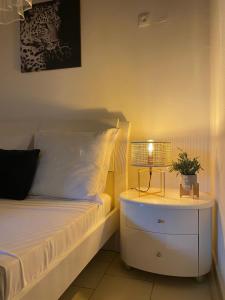 Postel nebo postele na pokoji v ubytování Chez Soul~Etage entier avec vue sur mer