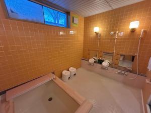 Bilik mandi di Niseko Pension Bellary +61 gambar