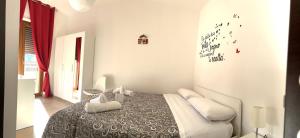 Postel nebo postele na pokoji v ubytování Sunrise Home