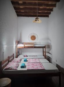 - une chambre avec 2 lits dans l'établissement AXÉ HOME Martha & Jorge, à Salvador