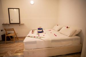 Letto o letti in una camera di iHaven Thulusdhoo