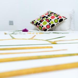 Letto o letti in una camera di iHaven Thulusdhoo