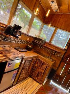 an overhead view of a kitchen with windows at Cabañas Tierra Fértil #2 in Montaña +3 photos