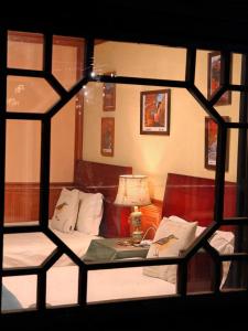 Beijing Badaling Great Wall Caos Courtyard Hostel 1VIP service 2Ancient style Chinese yard 3 only 15 minutes walk to the Badaling Great Wall 4 be your free advisor 5 offer private guided tour 6 experience local food and culutre客房内的一张或多张床位