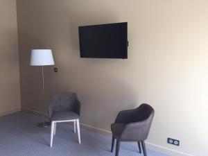 TV in/ali zabaviščno središče v nastanitvi Dans les Vignes