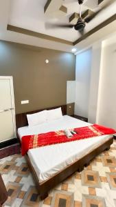 Voodi või voodid majutusasutuse Hotel Rudraksh toas