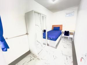 Postel nebo postele na pokoji v ubytování San Alexander