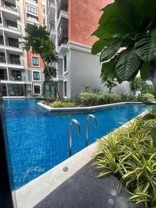 المسبح في Espana Condo Resort Pattaya F108 أو بالجوار