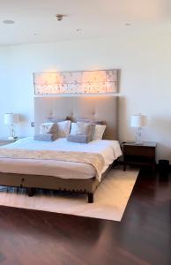 Postel nebo postele na pokoji v ubytování Burj Khalifa