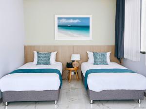 Sand Dance Hotel客房内的一张或多张床位