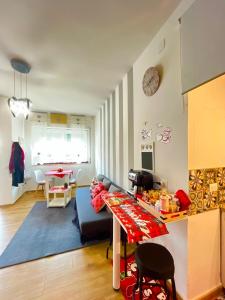 a living room with a couch and a table at HOME SWEET HOME Vanini in Lecce