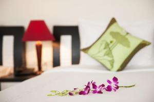 Voodi või voodid majutusasutuse Serenity Villa Hotel toas