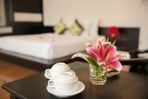Voodi või voodid majutusasutuse Serenity Villa Hotel toas