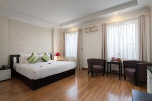 Voodi või voodid majutusasutuse Serenity Villa Hotel toas