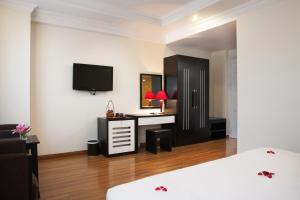 Voodi või voodid majutusasutuse Serenity Villa Hotel toas