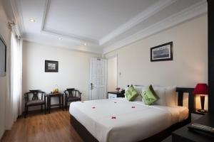 Voodi või voodid majutusasutuse Serenity Villa Hotel toas