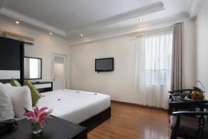 Voodi või voodid majutusasutuse Serenity Villa Hotel toas
